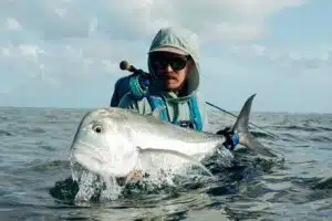 Jasper with a Seychelles GT caught with one of our giant trevally flies