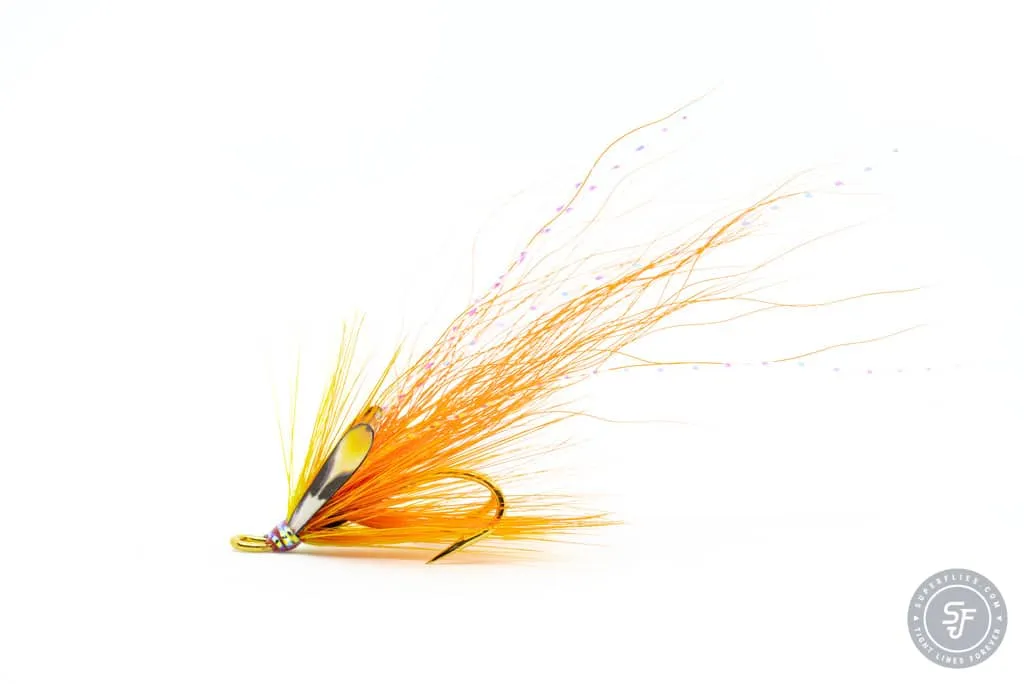 a flame orange double hook fishing fly