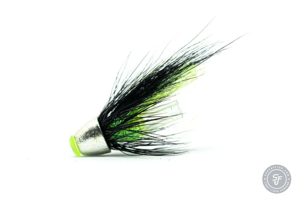a black and green salmon tube fly