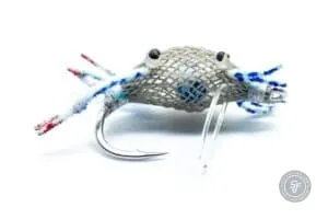 A blue fishing fly depicting a fleeing crab